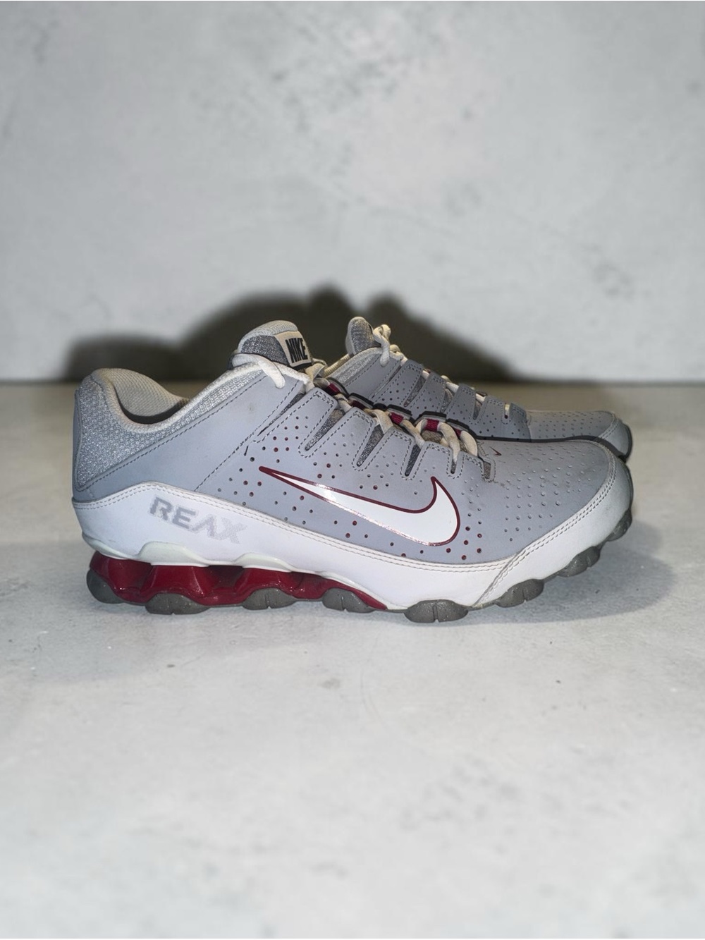 Nike Youth Gray Sneakers with Red Accents